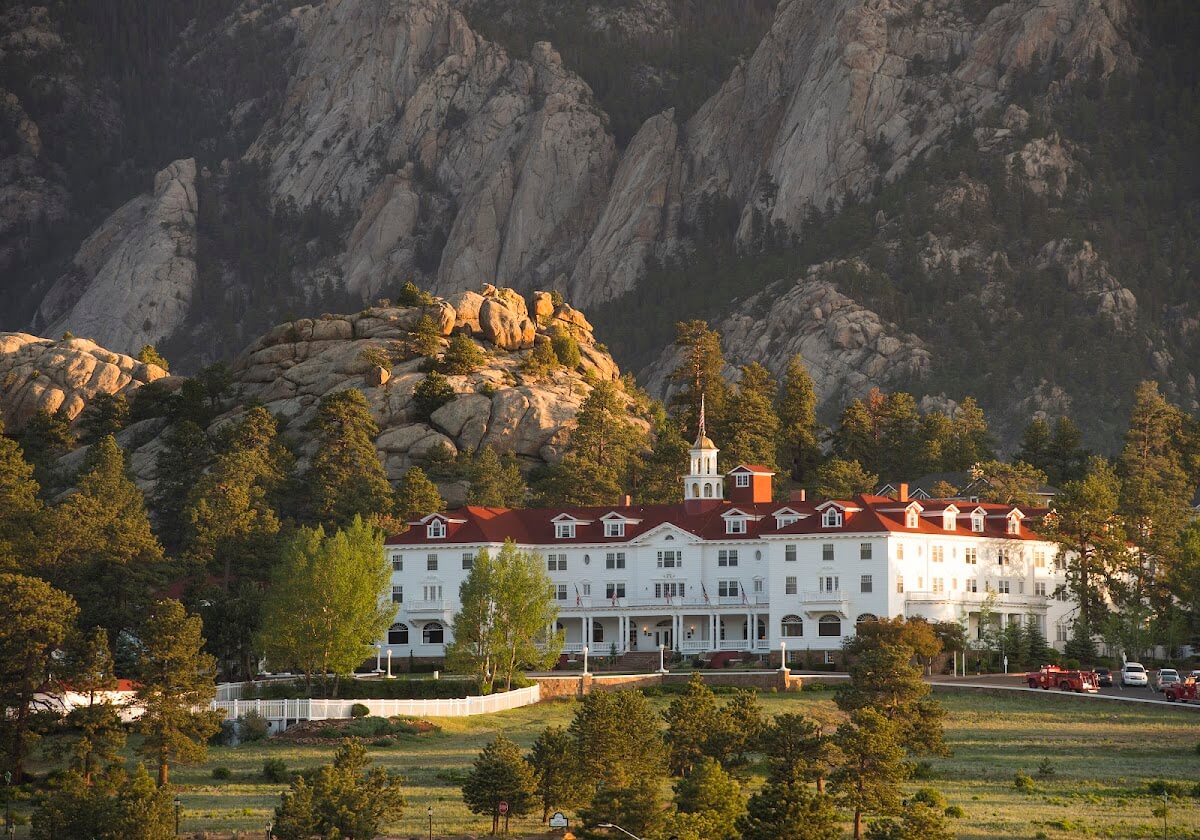 The Stanley Hotel surrounded by rocky mountains