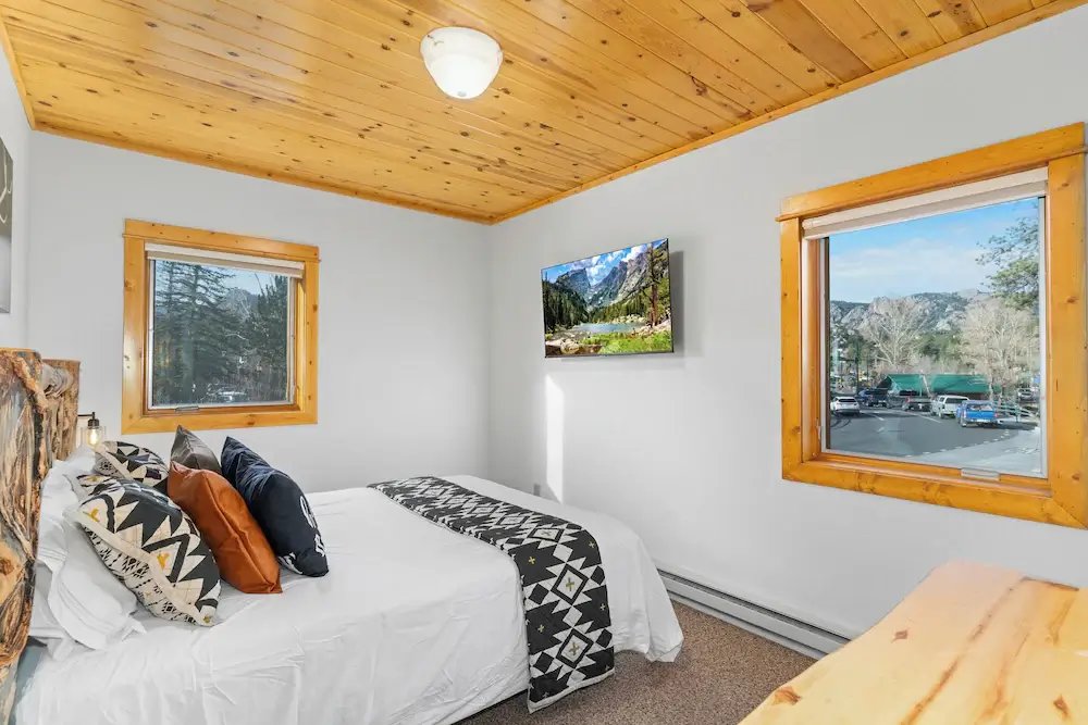 Retreat on the banks of the Big Thompson River in Downtown Estes Park!